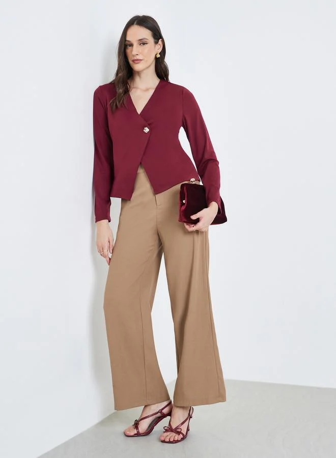 ستايلي بلوزة بتصميم لف وأكمام طويلة